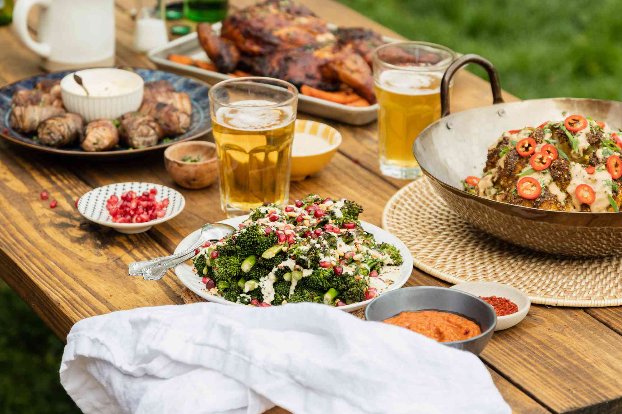 Spread of grilled dishes outdoors