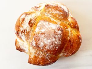 A loaf of bread on a light surface