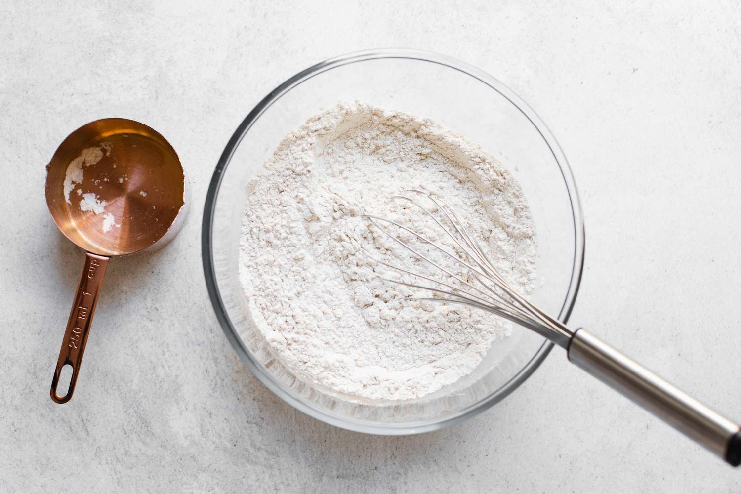 Dry Ingredients Whisked Together in a Bowl for Banana Sheet Cake Recipe