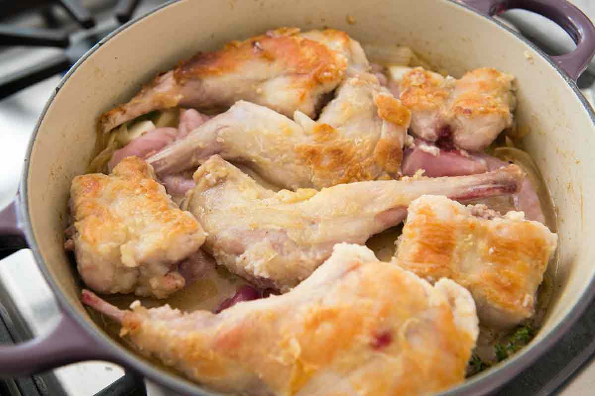 add browned rabbit to pot for braised rabbit recipe