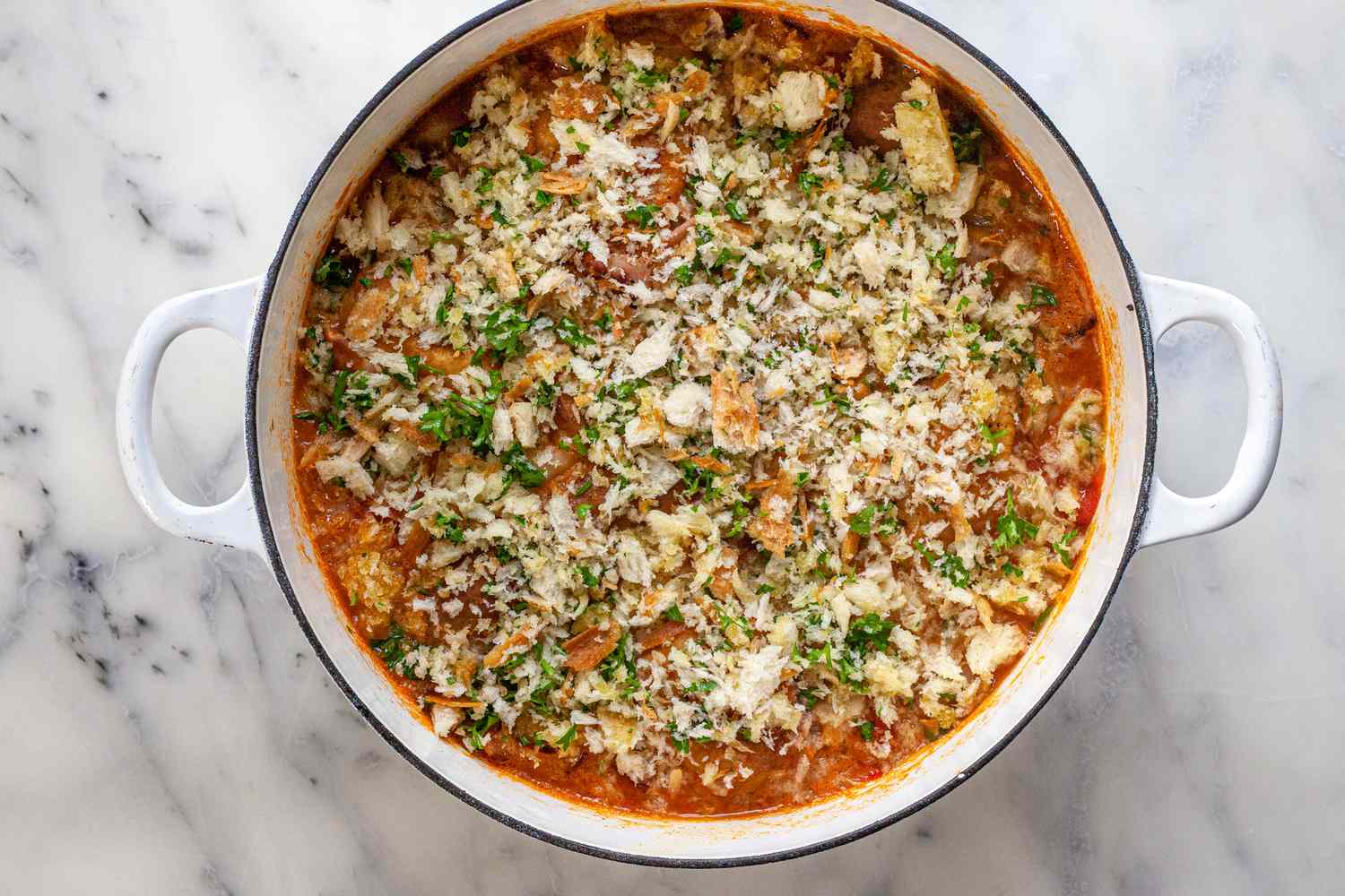 Cassoulet with breadcrumbs sprinkled on top.