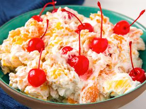 Rosa marina salad garnished with cherries in a bowl