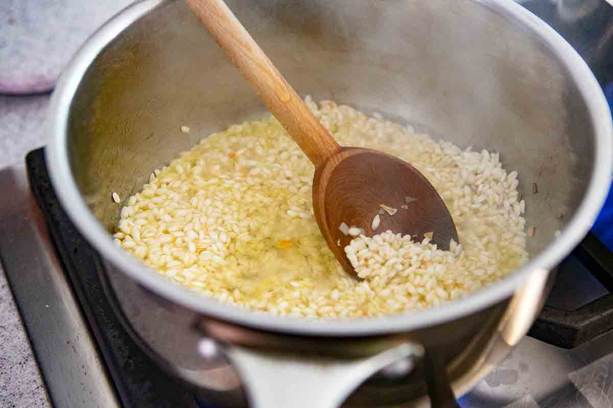 stir rice until wine is absorbed in pot