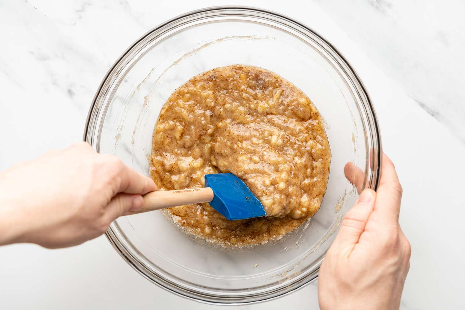 Spices Folded Into the Bowl of Mashed Bananas for Coffee Banana Bread Cake Recipe