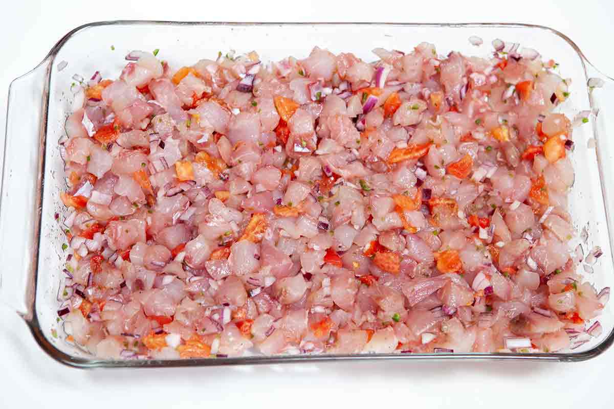 Combine the fish, onion, tomatoes, chili, salt, Tabasco, and oregano for the ceviche in a non-reactive dish