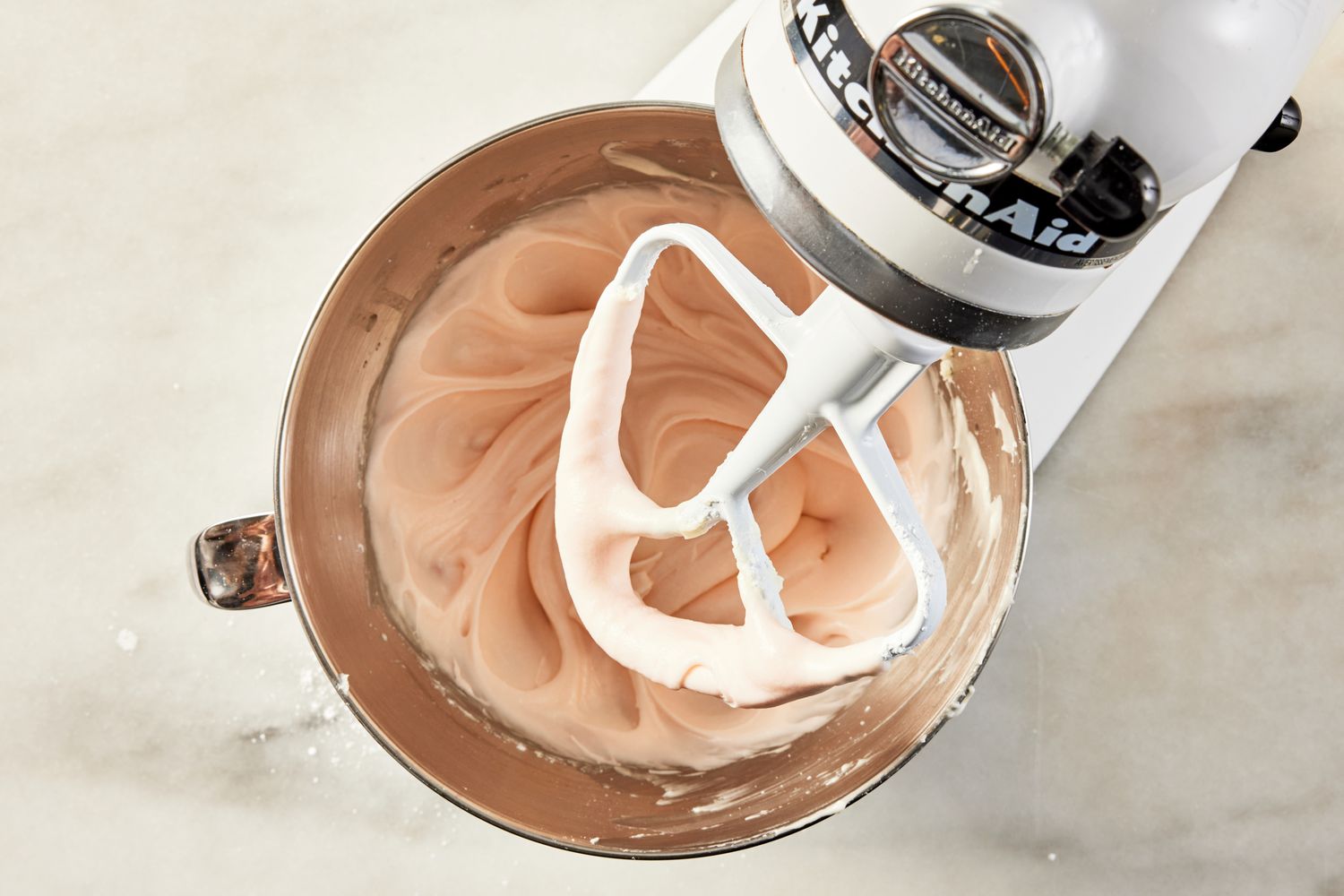 food coloring added to buttercream for pink lemonade cake recipe