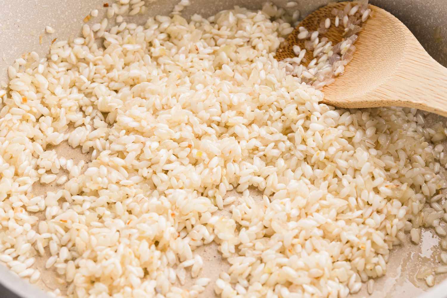 Lightly Fry Rice in Pot for Venetian Shrimp Risotto