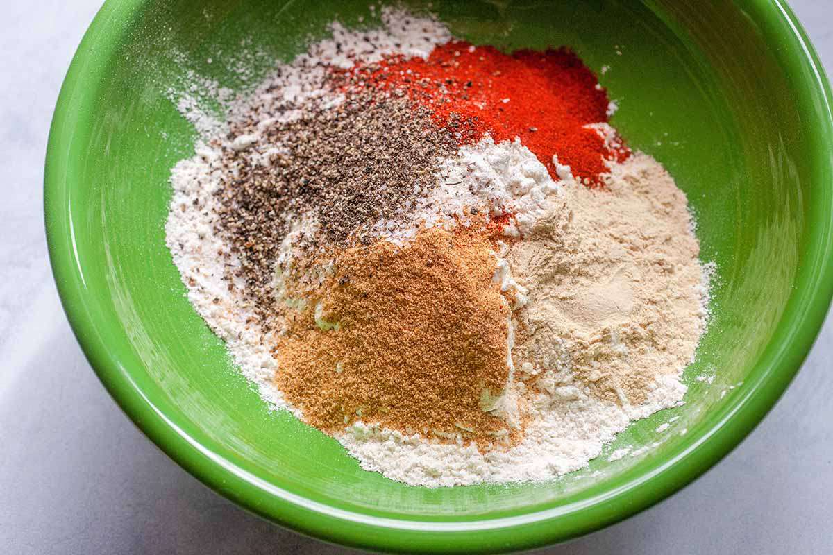 Breading ingredients in a bowl, ready to mix for breading air fried chicken