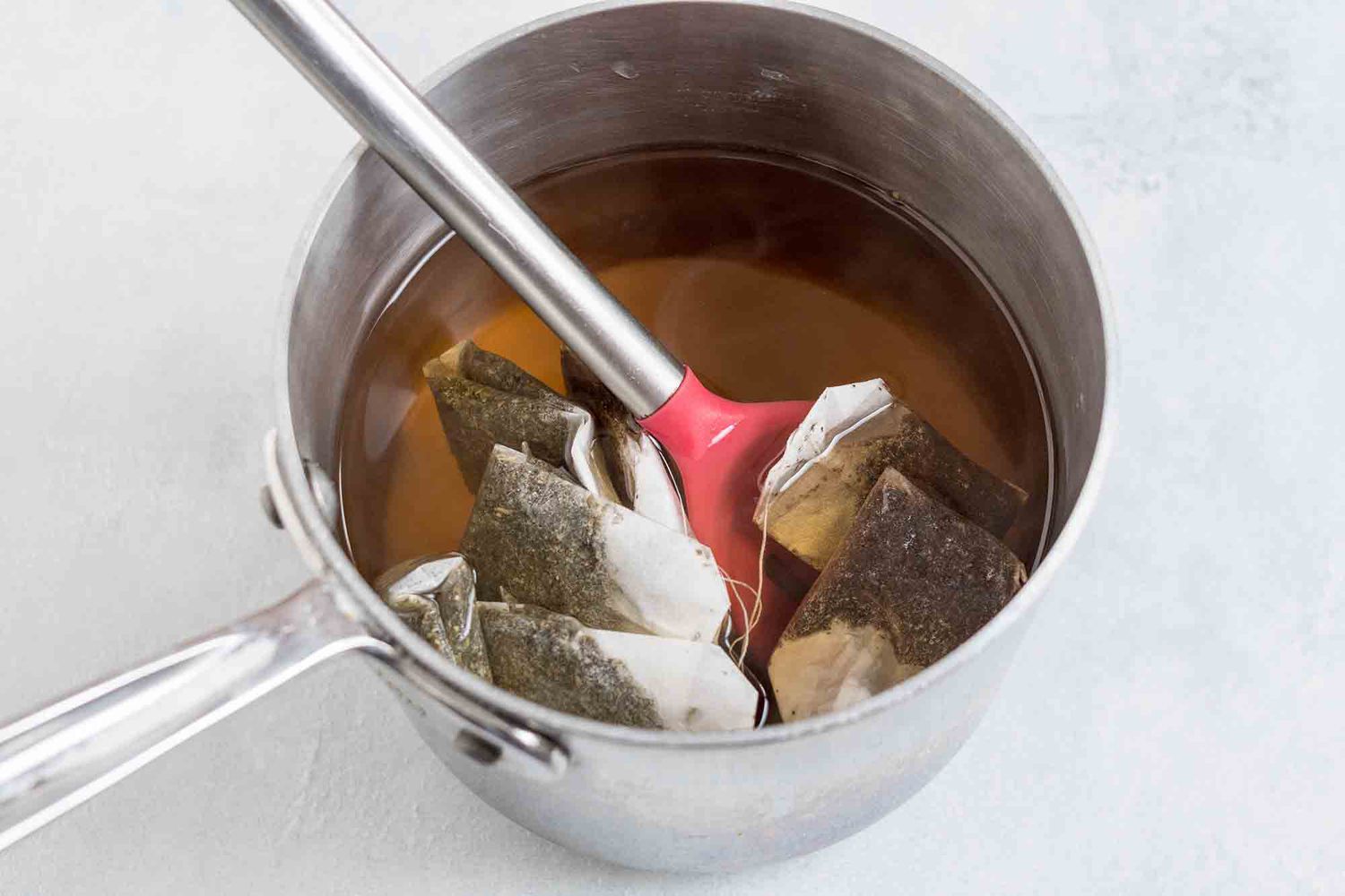 Let the tea for making kombucha steep in the medium saucepan for at least 10 minutes or up to a few hours