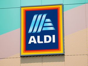 The Aldi logo on a wall