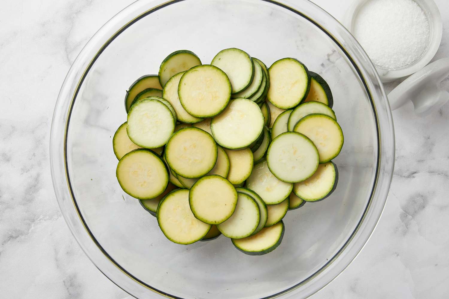 Zucchini slices in a clear bowl