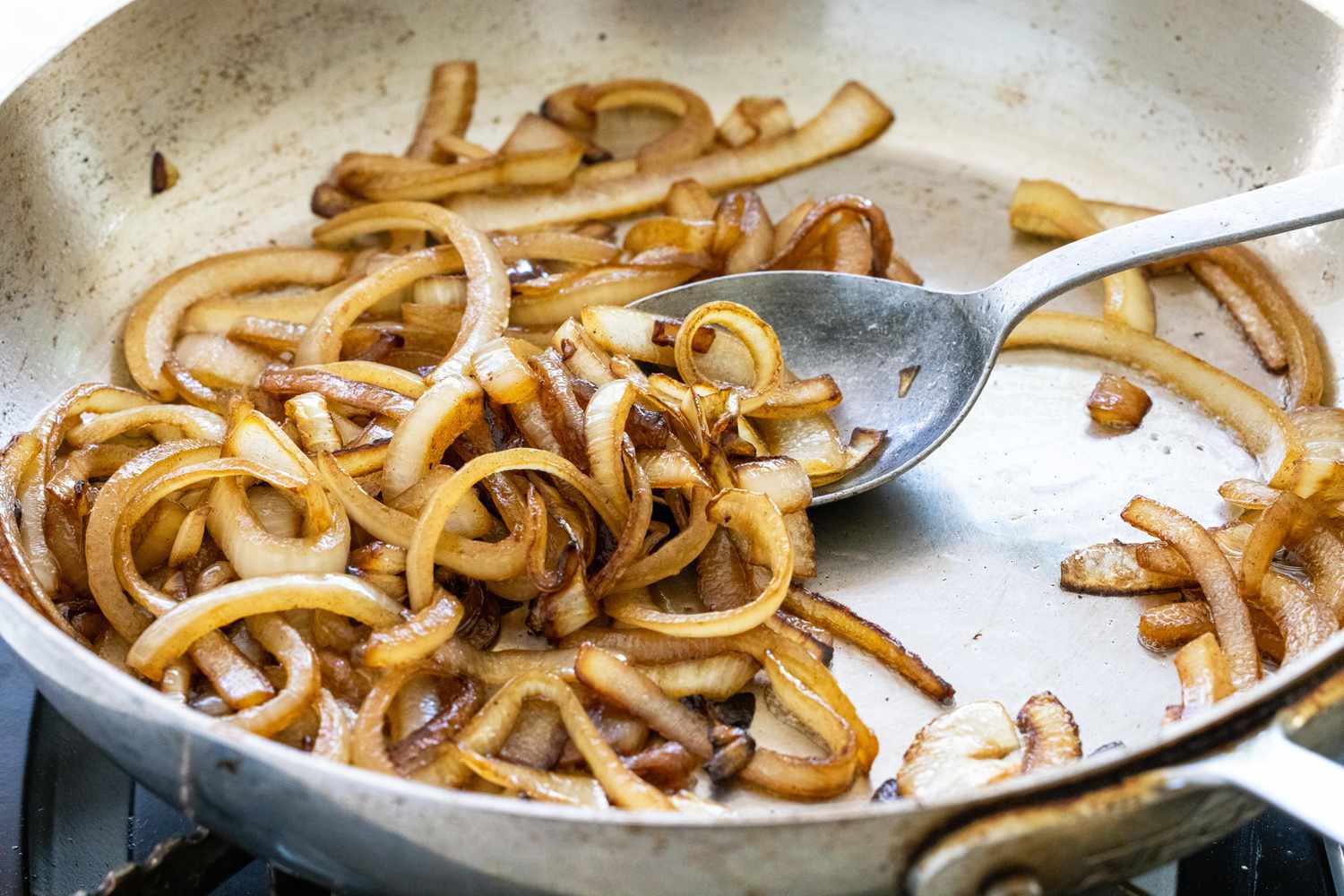 Caramelizing onions for goat cheese crostini with mushrooms 