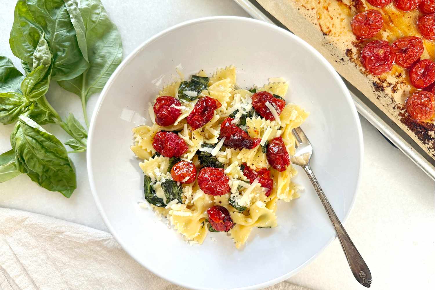 a bowl of Samin Nosrat's Pasta with Tomato "Candy" with a fork