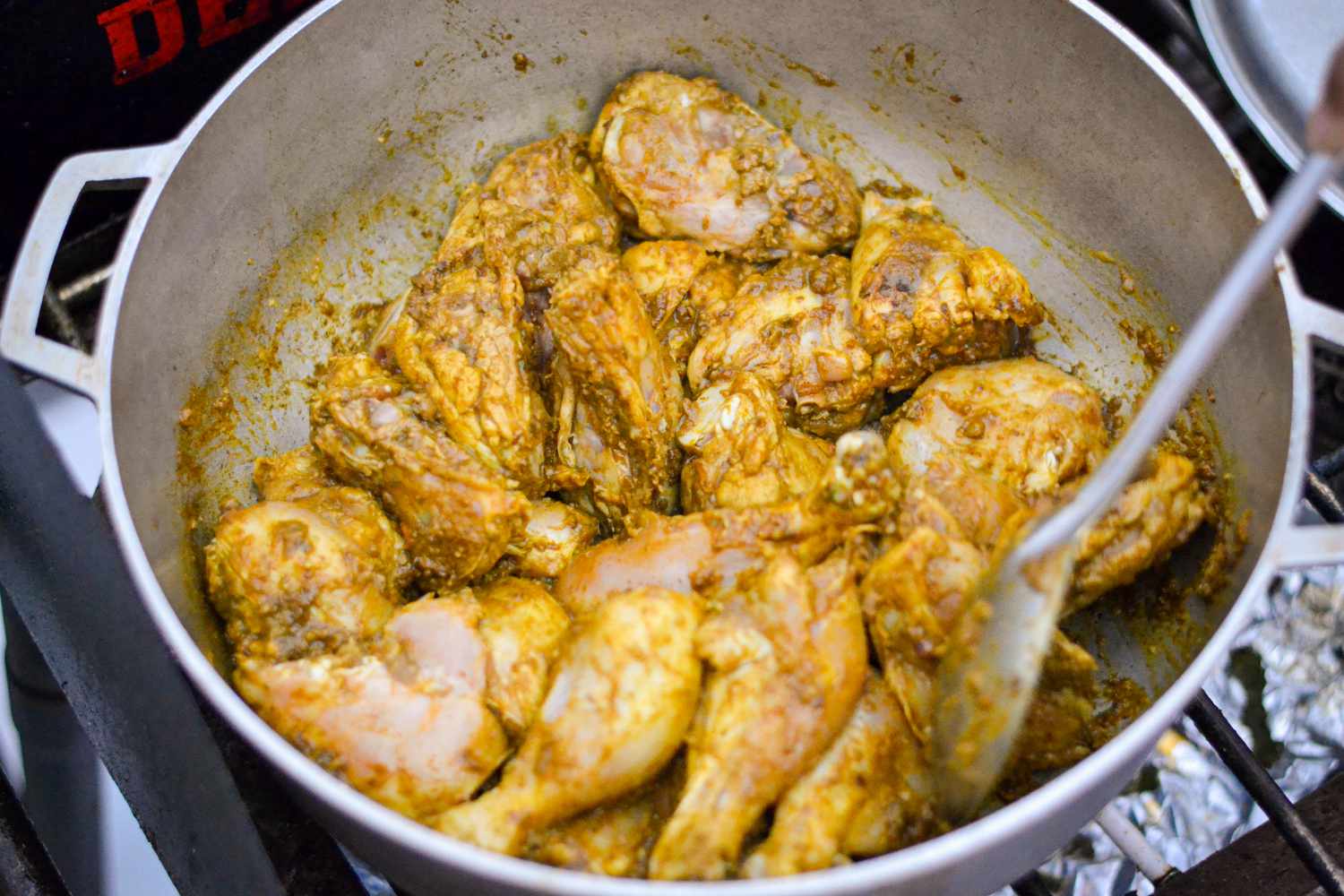 Guyanese Chicken Coated in Curry Paste in Pot 