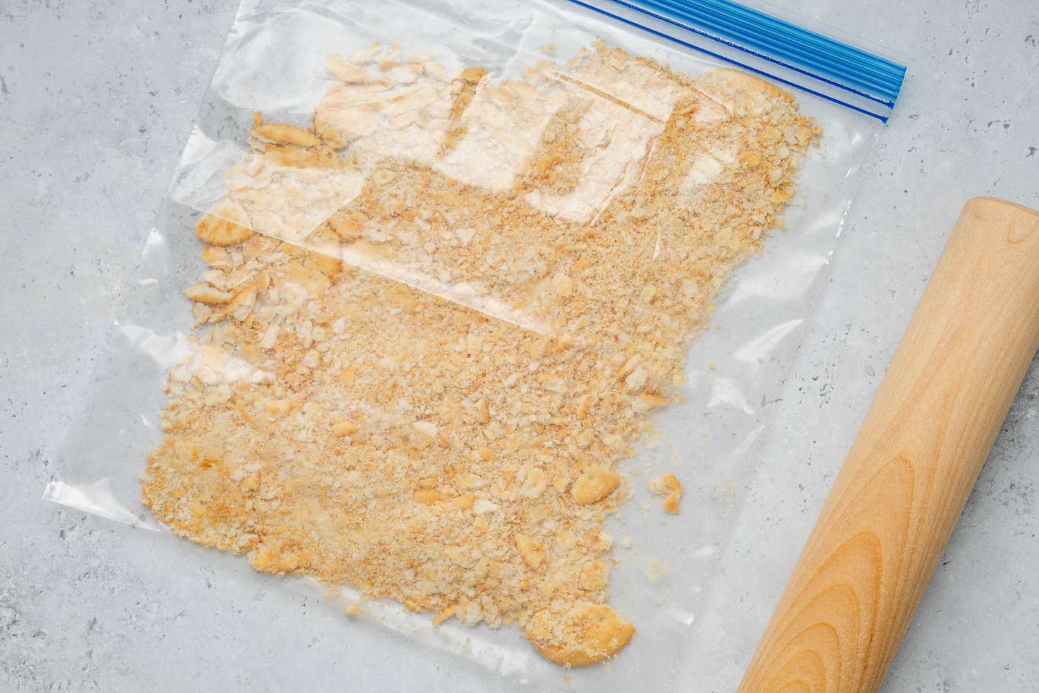 Crushed ritz crackers in a large ziploc bag for ritz torte recipe