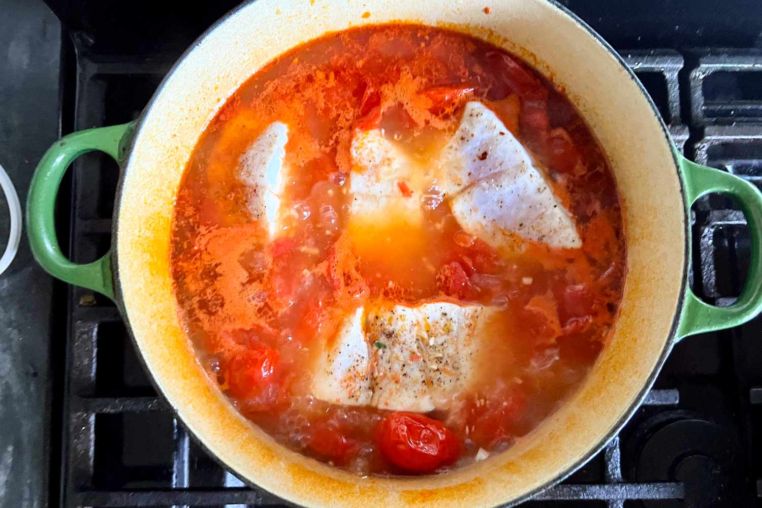 overhead view of a pot of Marcella Hazan’s “Fish in Crazy Water”