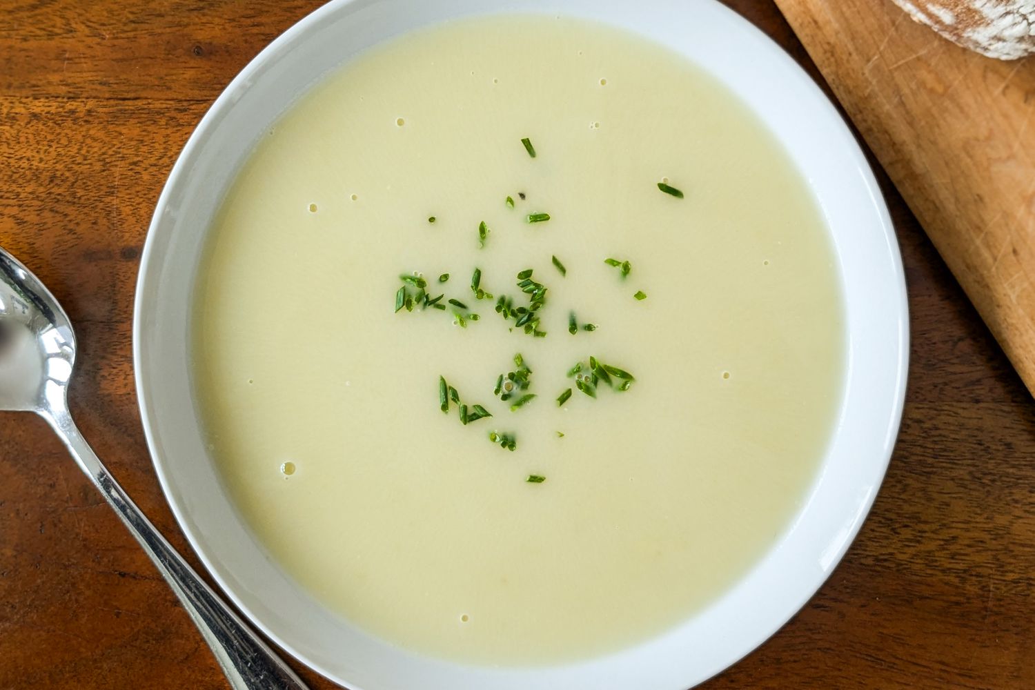 An overhead shot of a bowl of soup