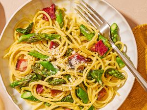 overhead view of a plate of Spring Carbonara with a fork