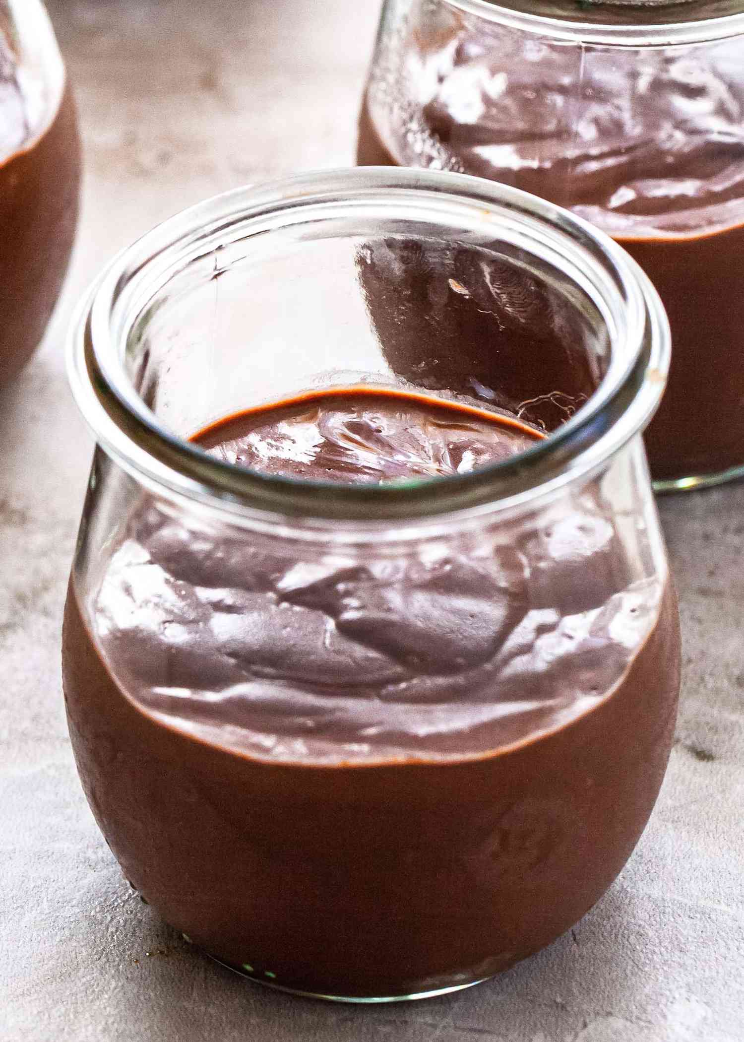 Glass cup of homemade chocolate pudding.