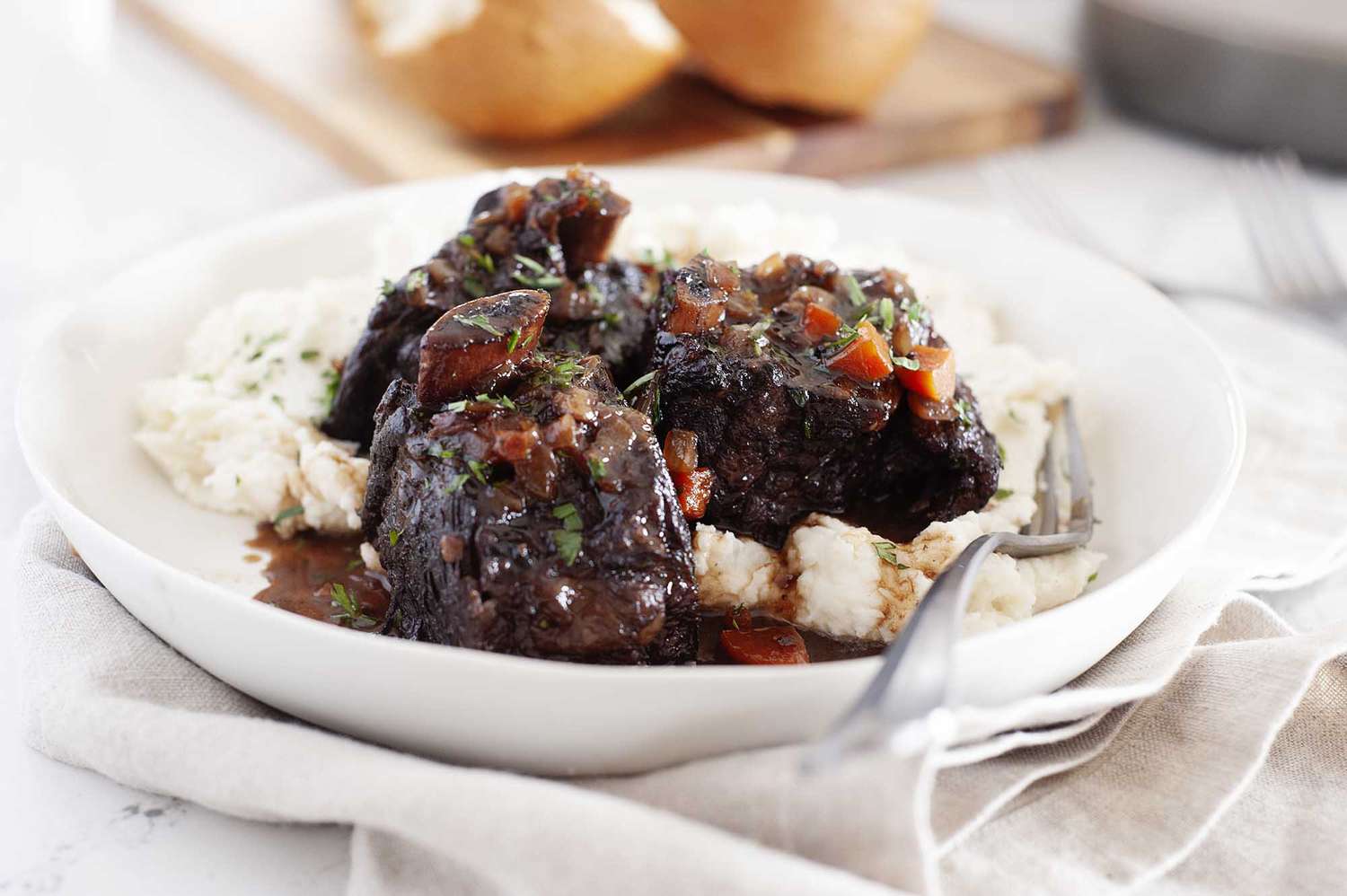 Beef short ribs on a plate.