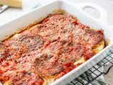 Baked eggplant parmesan in a casserole dish.