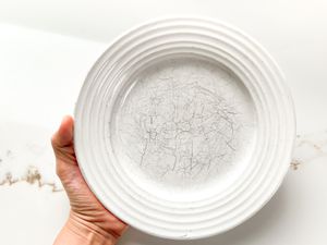 scratched white plate