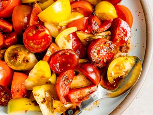 5-ingredient chili crisp tomato salad on a plate (close-up)
