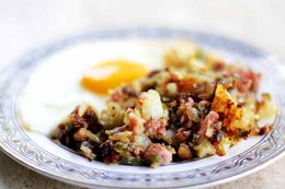 A plate of ham and potato hash