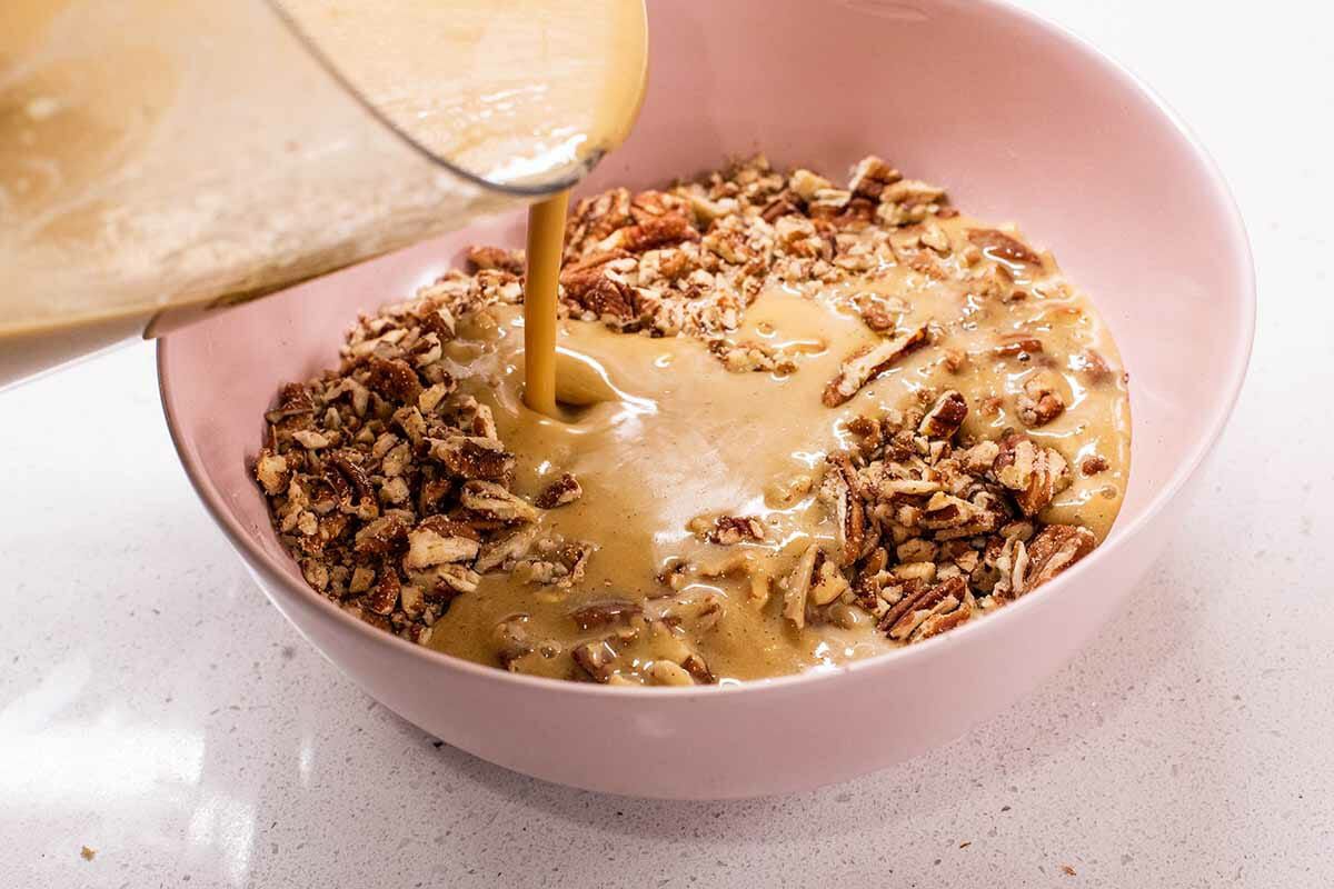 Best Ever Pecan Pie Bars pour the mix over the chopped bars
