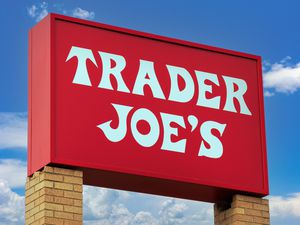 A Trader Joe's store sign on a red background