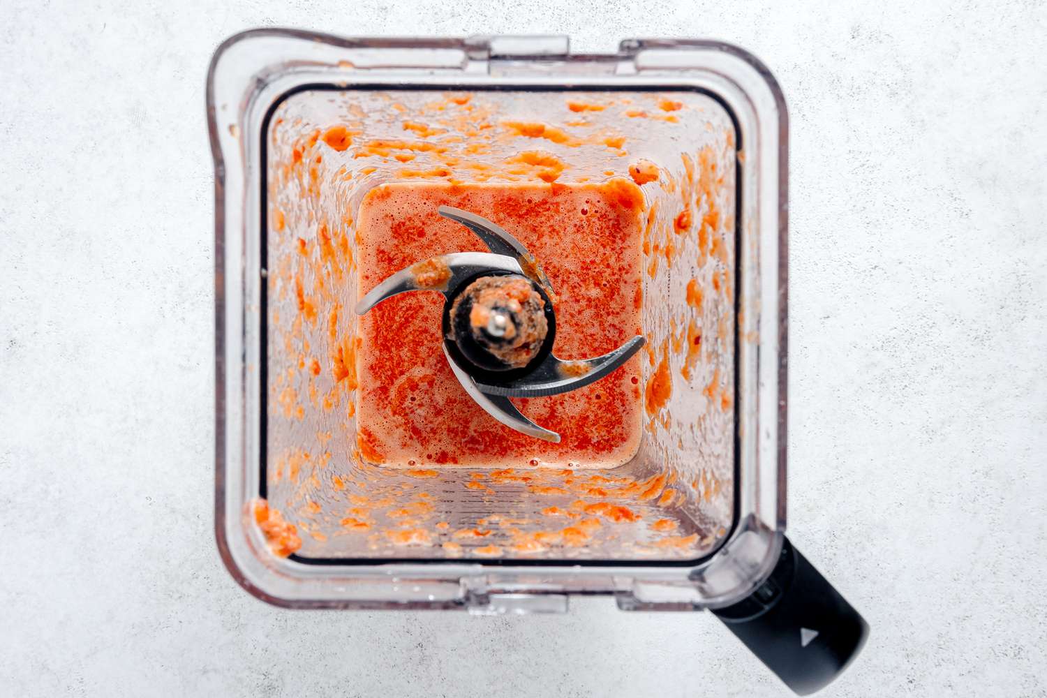 Pureed Ingredients in a Blender for Jollof Rice Recipe