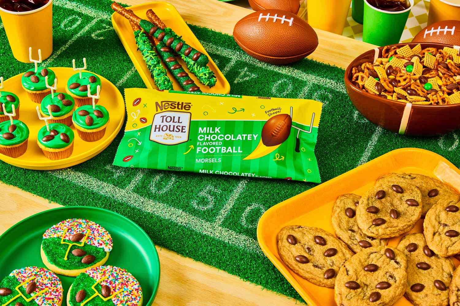 Dessert items arranged on a footballthemed table with Nestle Toll House chocolate chips prominently displayed