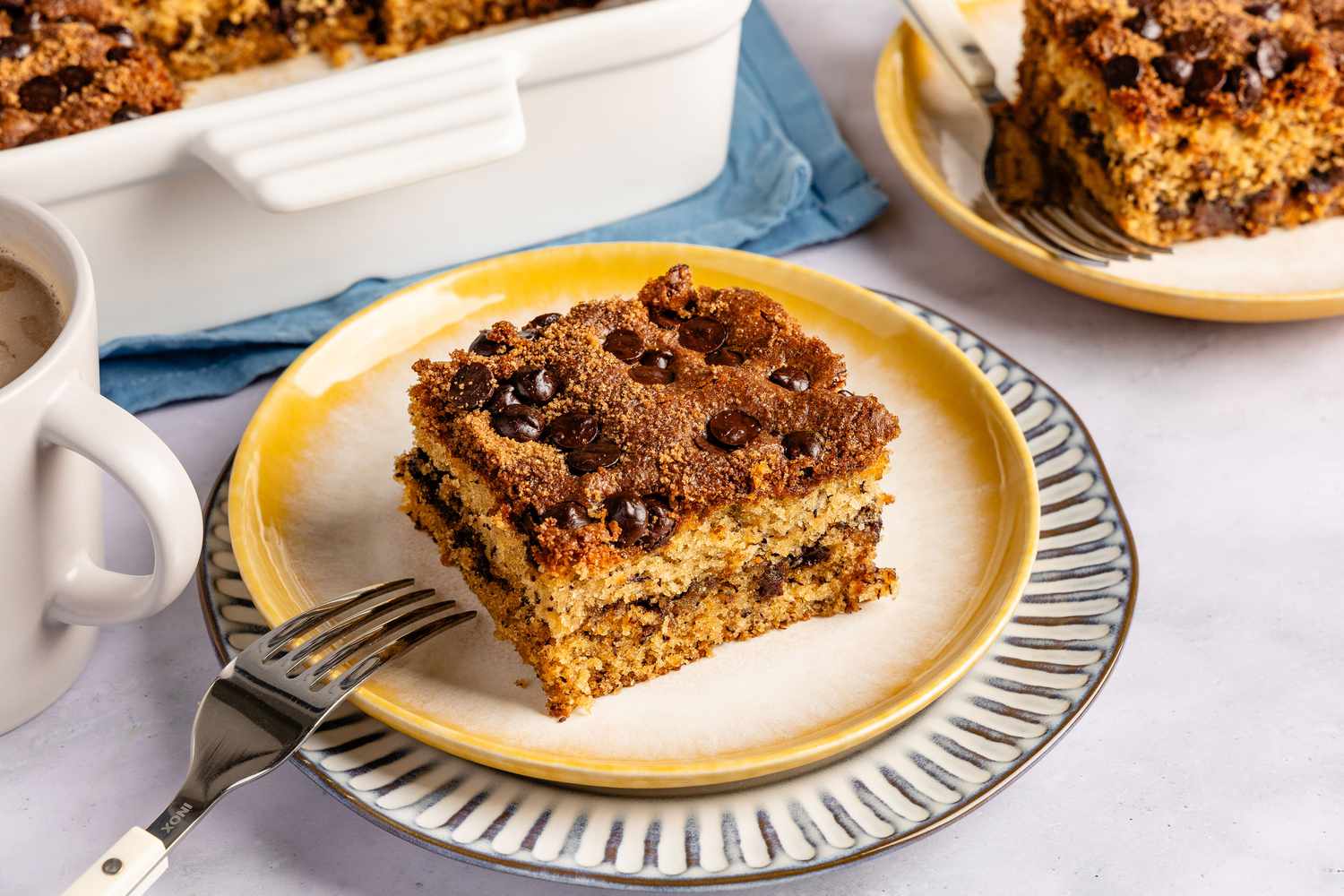 a slice of Ponderosa Cake on a dessert plate with a fork