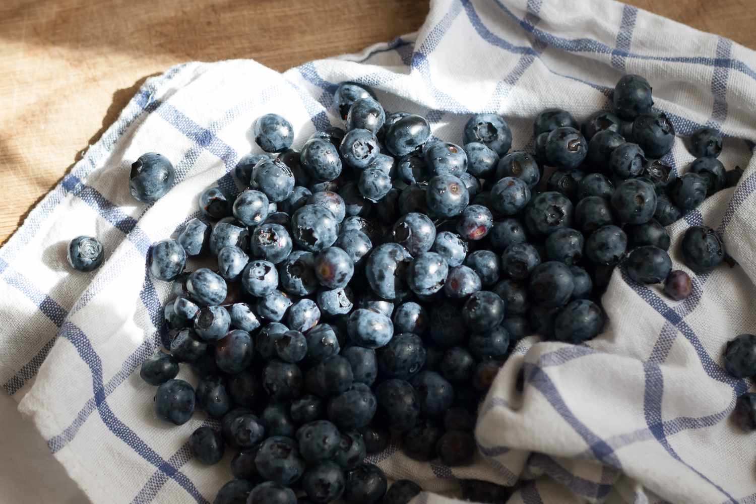 blueberries on a kitchen towel