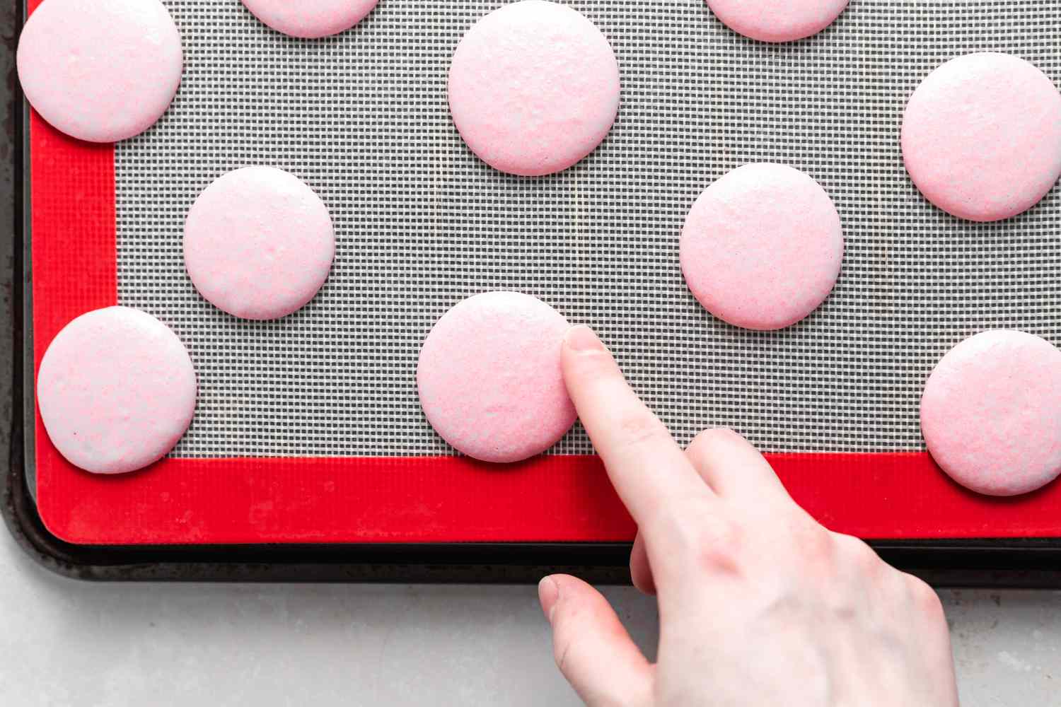 Baked strawberry shells for macarons.