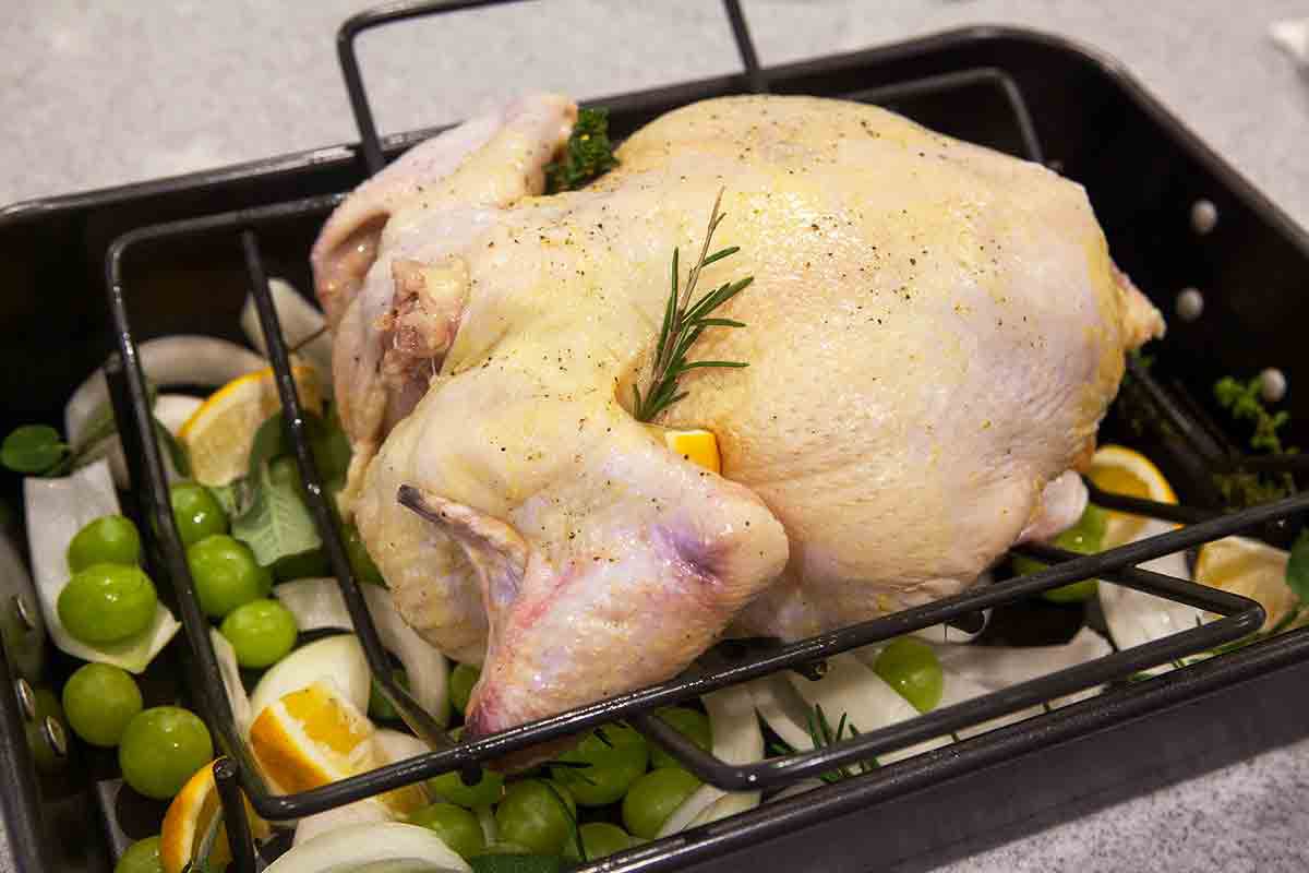 arrange grape stuffed chicken on roasting pan