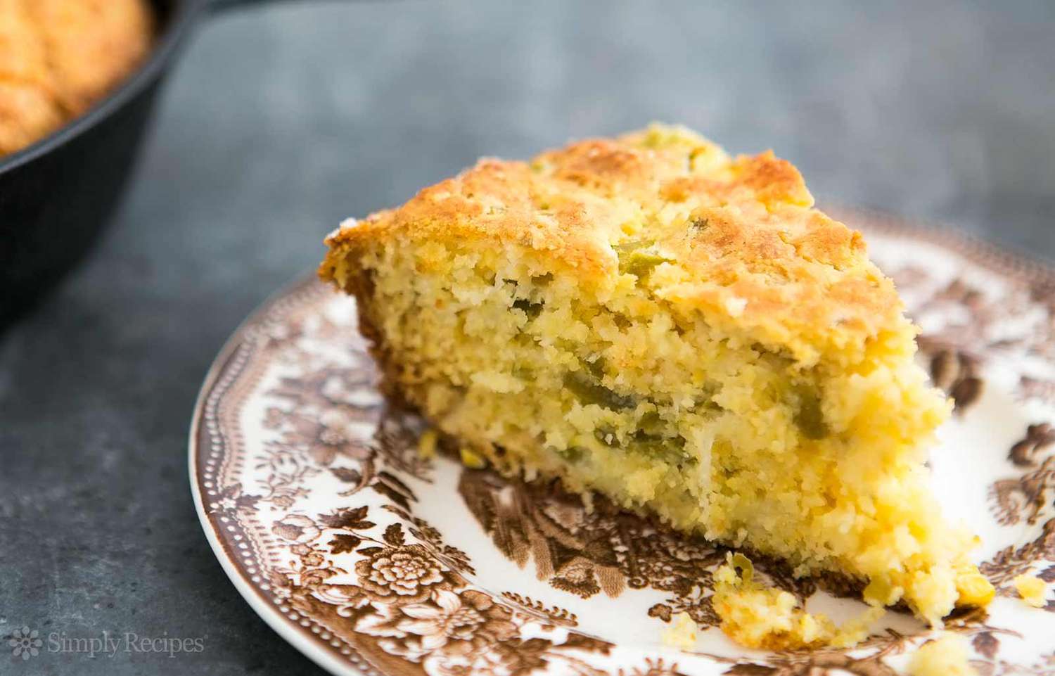 A slice of jalapeno cornbread on a plate