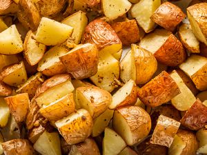 Golden-brown, seasoned, and roasted diced potatoes