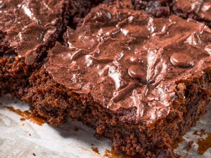 brownie on a piece of parchment paper