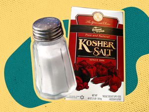 Table salt shaker and a box of kosher salt on a blue and yellow colorblock background