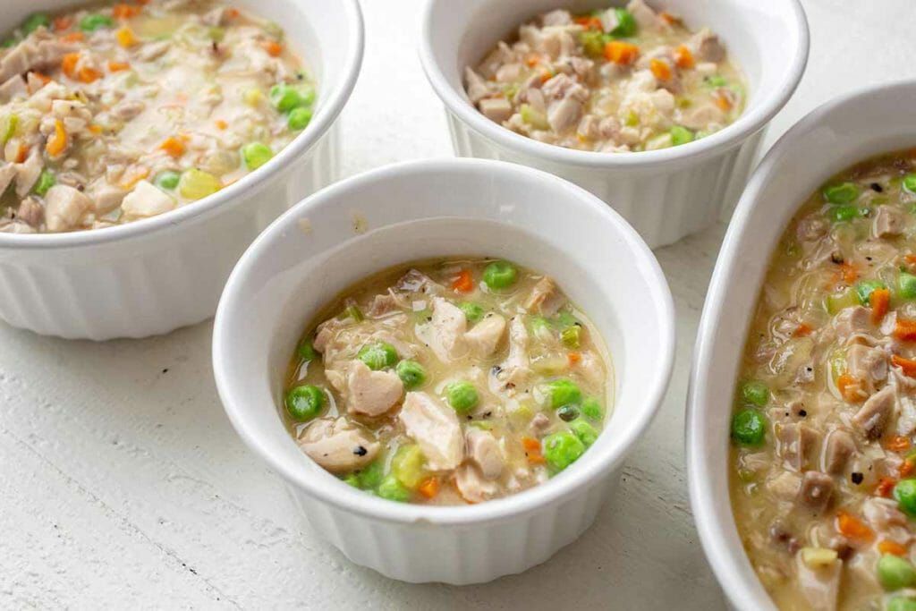 turkey pot pie filling in a small white ramekin