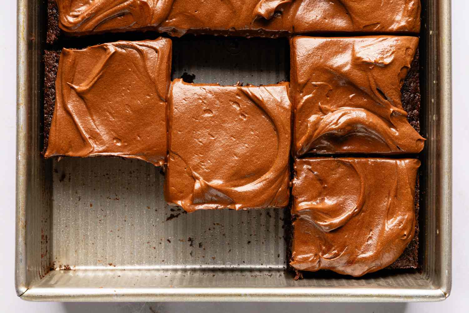 Overhead view of of slices of Easy Brooklyn Blackout Cake recipe in a baking pan