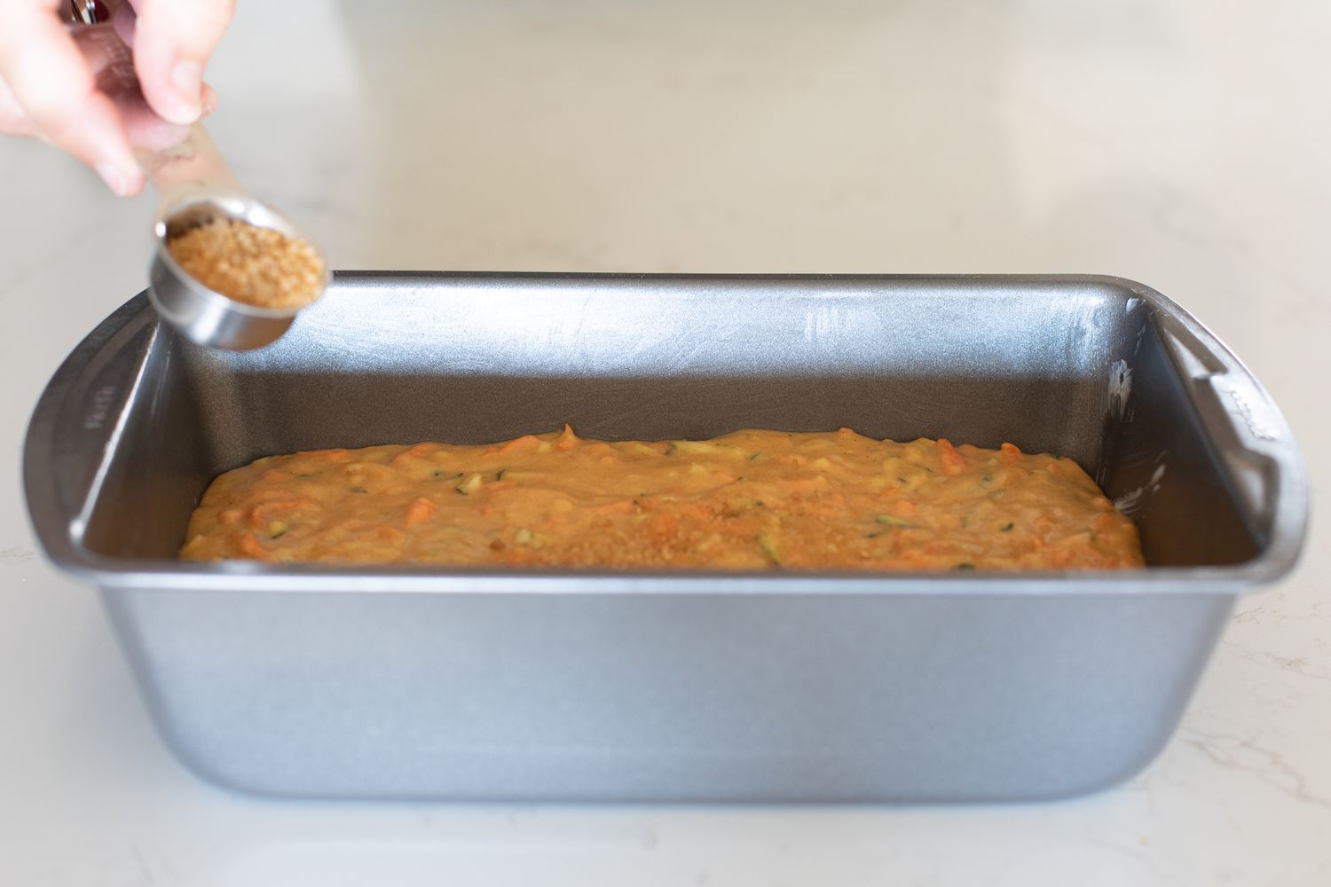 Zucchini Carrot Bread Batter in Loaf Pan