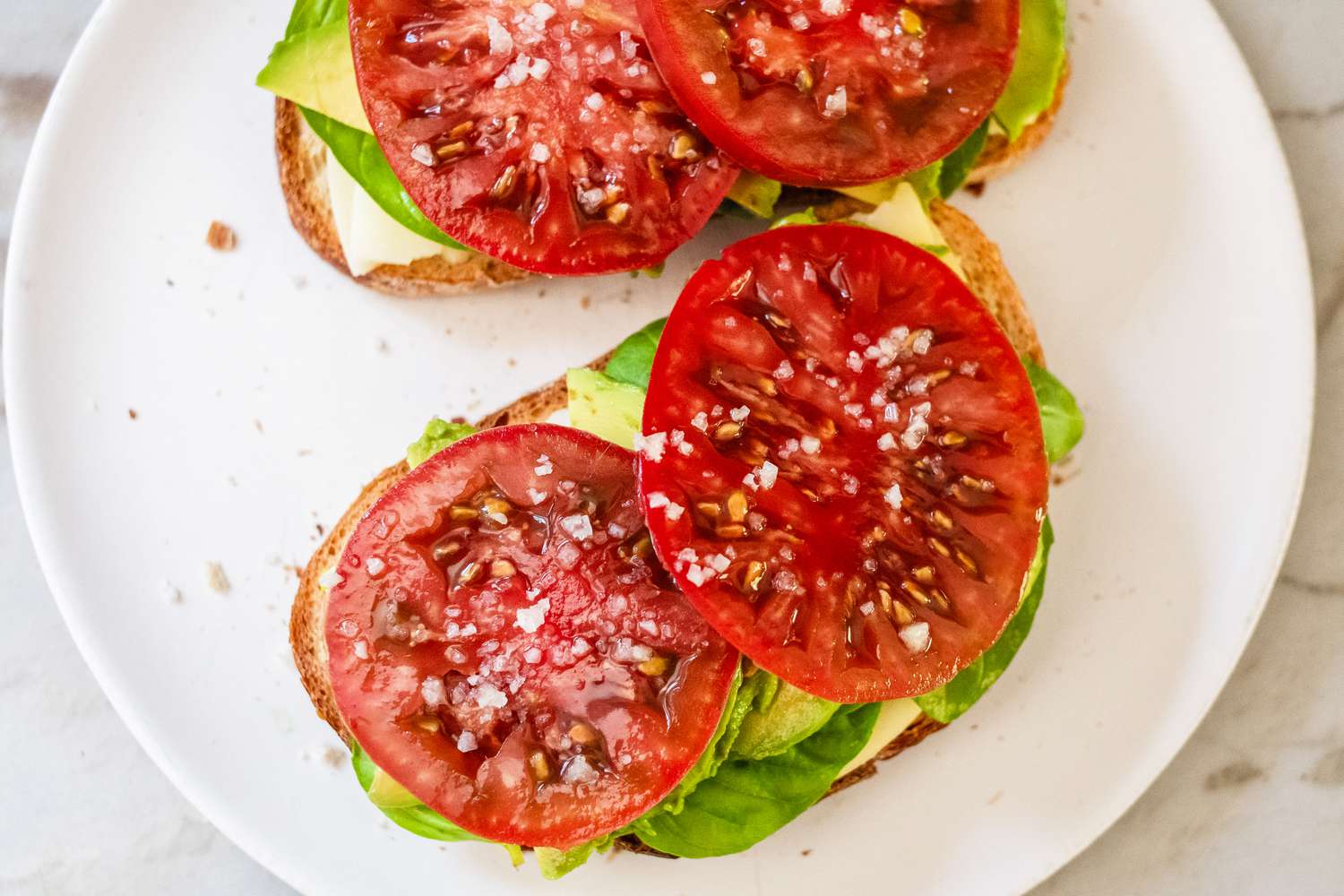 3-ingredient tomato sandwich (open-faced) on a plate