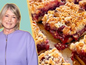Martha Stewart alongside a tray of cherry crumble bars