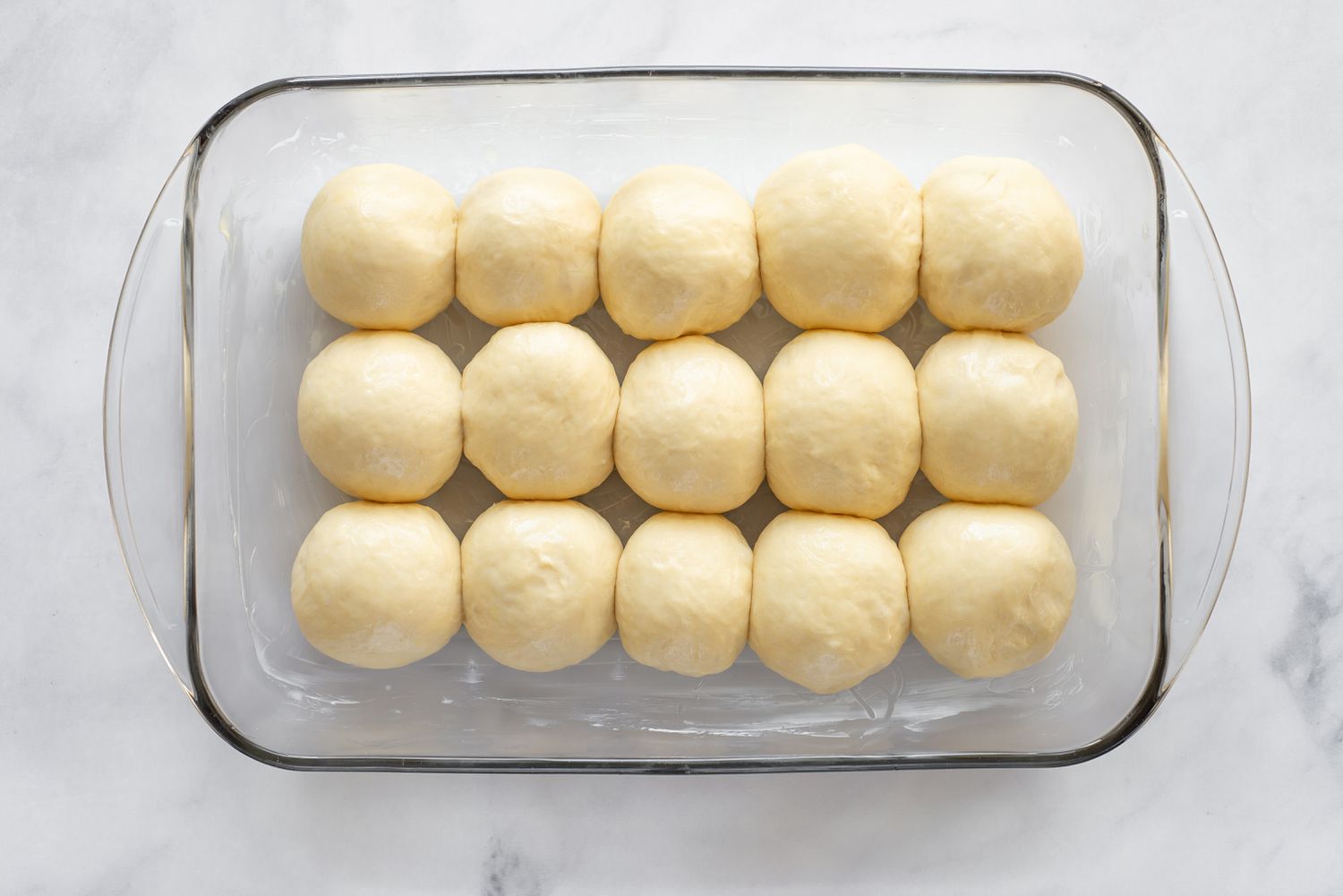 dinner roll dough in baking dish