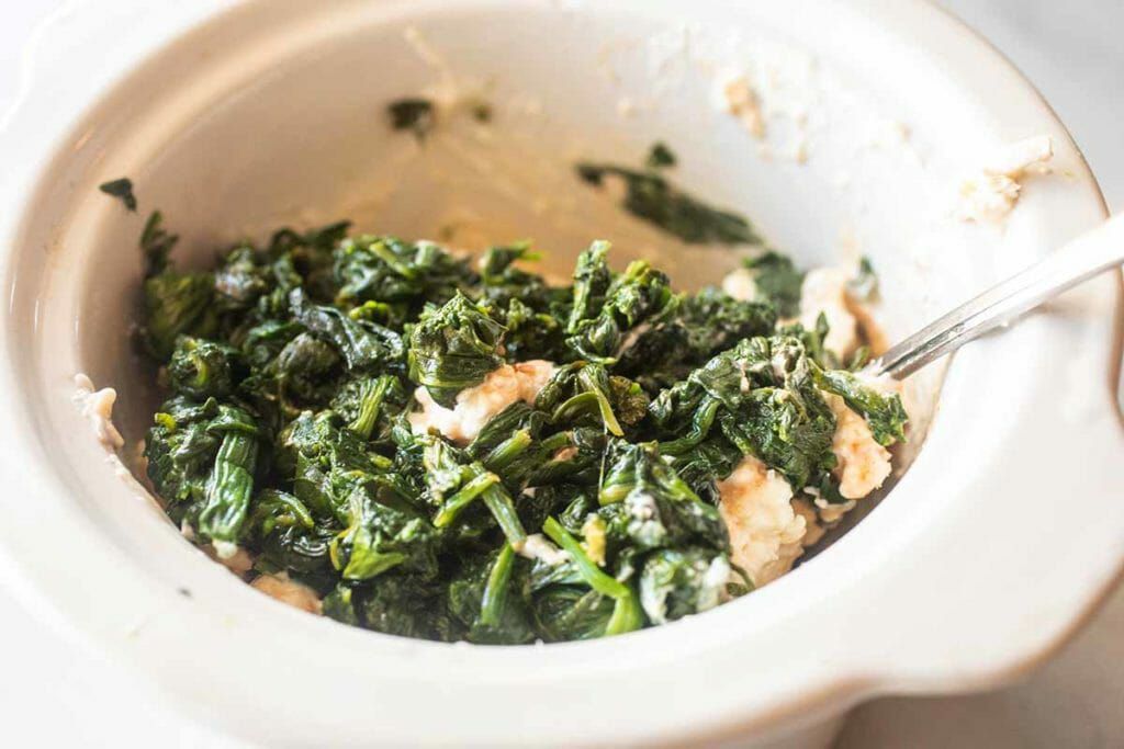 Mix spinach and feta for slow cooker spinach feta dip
