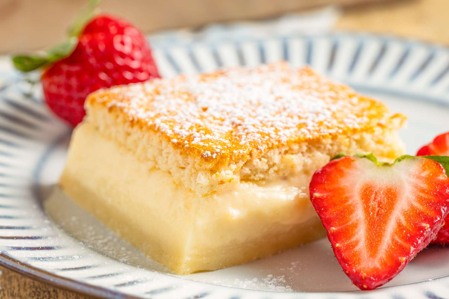 magic cake on a plate with strawberries