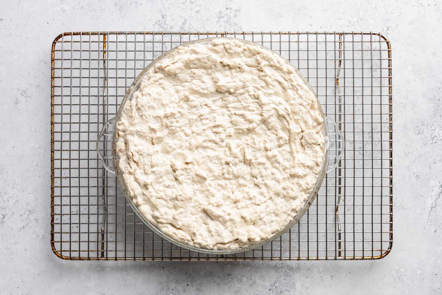 baked soda cracker pie in a baking dish (completely cooled and slighly deflated) on a wire rack for soda cracker pie recipe