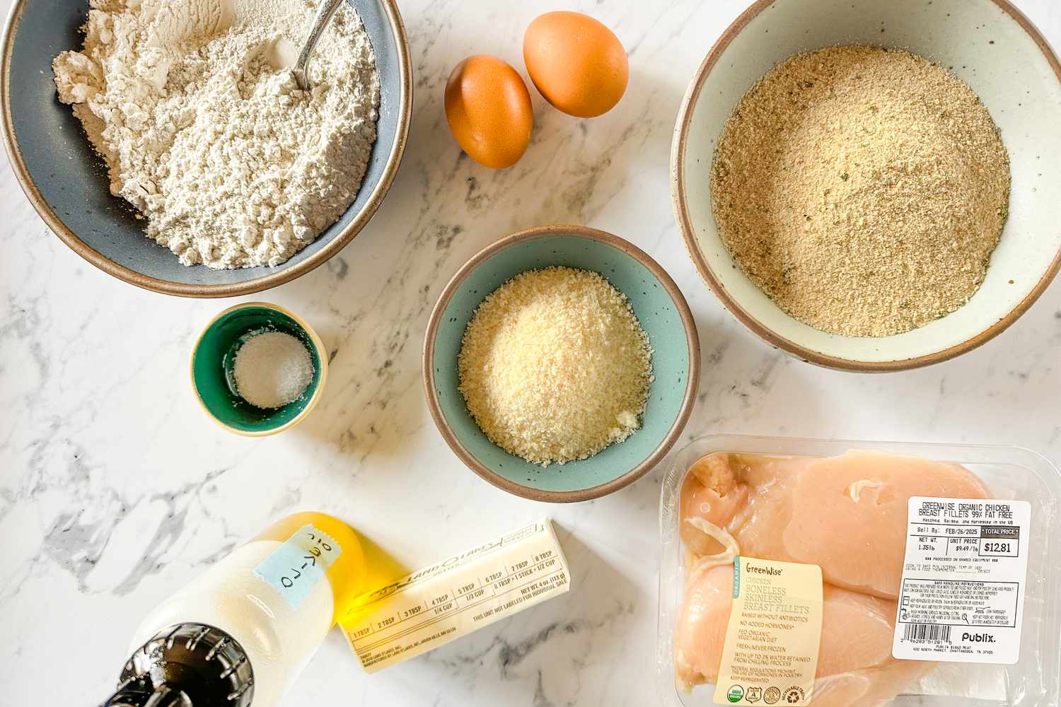 Overhead shot of the ingredients needed for Ina Garten's parmesan chicken